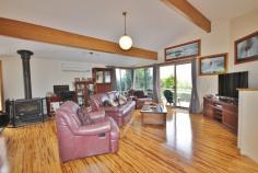  3 Hollydale Pl, Eden NSW 2551 $468,000 Immaculate 3 bedroom split level brick & tile home enjoying a sunny NE aspect in a quiet cul-de-sac location and boasting great views over Curalo Lake, Nth Twofold Bay & ocean. Features include a large open plan living area with raked ceilings and bamboo flooring, wood heater & r/c air con. Well appointed kitchen with pantry, large appliance cupboard & dishwasher. The master bedroom has a walk-through robe to en-suite. built-in robes in 2nd & 3rd bedrooms.  The living area opens to a timber deck - enjoying the views at the front and at the rear it opens to a paved undercover courtyard - great for BBQ's. Beautifully landscaped and a fully fenced backyard. Large double remote garage and plenty of storage.   Features Deck  Courtyard  Outdoor entertainment area  Fenced  Smoke Alarms  Ocean views  Garage Remote 