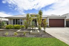  15 Brandalier Turn, Aveley WA 6069 $529,000 - $539,000 This spacious, quality-built Dale Alcock home with its triple garage is looking for a new owner and is located on a quiet Aveley street. With great street appeal and all of the "I Wants" that a family needs, this property is sure to be popular and viewing is a must to appreciate what is on offer.  Some of the features of this modern home include:  • 	 A large master bedroom with quality fixtures, fitted his and hers robes and direct access to a private courtyard.  • 	 The resort style ensuite has double vanities as well as a spa bath.  • 	 The kitchen comes complete with Essa stone, a 900mm cooktop and oven, glass splash back, dishwasher, double fridge recess and modern lighting.  • 	 The meals and family room are generous in size and there is a separate theatre room with double doors for privacy and the option to install a projector.  • 	 The study is close to the front of the house so an ideal space to work from home.  • 	 Bedrooms 2, 3 and 4 will hold a queen size bed and have ample robe storage.  • 	 The functional laundry room has a triple linen cupboard.  • 	 There is ducted reverse cycle air-conditioning as well as a security alarm on offer.  • 	 The outdoor entertaining area is substantial with a decked alfresco complete with a ceiling fan and gas point as well as a flat patio.  • 	 The triple garage has a roller door to the back gardens enabling easy access. This stunning home has raised ceilings throughout the living area adding to the feeling of spaciousness. With a block size is 666m2 and total property size of 317m2, there is room to move inside and out. Call CLAIRE HUGHES from ER REALTY on 0412 014 336 to view this property today! 