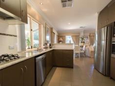  115 Oats St, Carlisle WA 6101 END DATE SALE all offers presented 17th April 2018 Conveniently located this beautifully presented as new home has so much to offer for your family, custom built in 2007 with all the modern finishing’s a 4 bedroom 2 bathroom home should have. As you enter through the front gate you will be impressed by the mature manicured gardens and trees, the portico and double front doors. Greeted in the entry hall and through the tiled family, dining and theatre room you will be impressed by the light and space in this living area. The functional centrally located modern kitchen with all its facilities includes gas plates, electric oven, dishwasher, a walk in pantry and plenty of counter space, this downstairs area is light filled and very spacious and has easy flow through to the covered outdoor alfresco area to comfortably fit your family and friend all year round. Property features as follows; • 	 4 Bedrooms, 2 Bathrooms 2 WC + Powder Room • 	 Central Theatre Room • 	 Chef’s Kitchen Lots bench space and breakfast counter • 	 gas hot plates electric oven dishwasher walk in pantry / Breakfast Bar • 	 Large Open Living and Dining rooms with tiled floors and access to covered courtyard • 	 Laundry room with walk-in linen press • 	 Window treatments including Drapes in dining and family room • 	 Light fittings • 	 Reverse Cycle zoned ducted Air Conditioning • 	 Alarm System • 	 Front Fence intercom and Electric Vehicle Gate • 	 Large Alfresco • 	 Fully Landscaped and Reticulated Mature Gardens and hedges • 	 Double Garage and 2 Storage Areas. • 	 Brick and Tile construction • 	 Large Master bedroom, WIR, ducted air conditioning, ensuite. • 	 Bedroom 2 has BIR Window Treatments, ducted air & carpeted • 	 Bedroom 3 has BIR Window Treatments ducted air & carpeted • 	 Bedroom 4 has BIR Window Treatments ducted air & carpeted • 	 Dble garage and extra for storage plus store room under home • 	 Auto Reticulation • 	 Brick paved gated and secure driveway • 	 (5.3 km) to Optus stadium • 	 (5.5 km) to Curtin university • 	 (4.0 km) to Burswood casino inspections by appointment with Michael Martino 0417474105 michael@martinopg.com.au 