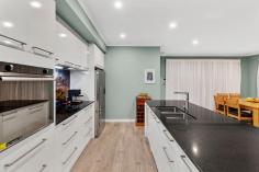  21 Silvereye Street Kealy WA 6280 $425,000 - $435,000 First time offered to the market is this fantastic easy-care living home located in the new Dawson Estate Kealy with schools, shopping centre and medical centre all close by. This cleverly designed residence will impress the most fastidious of buyers with all its extra features and quality fittings adding to the homes energy efficiency.  The heart of the home is the gourmet open plan kitchen which features stone bench tops, a large island bench top, plenty of cupboard space and top quality appliances all overlooking the family and dining area with a triple stacked sliding door opening to the gorgeous paved alfresco enclosed by glass doors and tinted windows for all year entertaining.  Also comprising a spacious master bedroom, deluxe ensuite with hobless shower, well sized other bedrooms with built-in robes, separate theatre room and main bathroom with beautiful free standing bath, ingenious attic storage and more. Other highlights of this home include: â?¢ 	 Beautiful portico entrance with 1200mm feature door with steel mesh security door â?¢ 	 Separate theatre room which could be utilised as a fourth bedroom â?¢ 	 Gourmet kitchen with engineered stone benches, custom glass splashback, overhead  cupboards, Ariston induction cooktop and self-cleaning oven, plumbed fridge recess,  integrated Asko dishwasher. â?¢ 	 Generous master bedroom with 4 door built-in robe and deluxe ensuite with hobless  shower recess â?¢ 	 Good sized secondary bedrooms, both featuring built-in robes  â?¢ 	 Spacious laundry with stone bench tops, linen press and broom closet â?¢ 	 Free standing deep soaking bath in main bathroom â?¢ 	 High ceilings in entry and open plan living â?¢ 	 LED lighting throughout home â?¢ 	 Kelkom home intercom system with video â?¢ 	 Triple stacking door opening to the enclosed alfresco area with tinted windows to  enjoy all seasons â?¢ 	 Double glazed windows all through home with tinted east and west facing windows â?¢ 	 High quality insulated blinds for added comfort â?¢ 	 Noise reducing solid core doors to all rooms â?¢ 	 Low maintenance gardens with extensive use of travertine pavers around home â?¢ 	 Double insulation in roof â?¢ 	 Extra storage space in ceiling with mezzanine flooring, light and power point via attic  loft ladder located in garage â?¢ 	 Energy efficient Stieble Eltron heat pump hot water system â?¢ 	 Extra high double garage with shoppers entrance With a well-considered floor plan & modern features, all you would need to do is add your own finishing touches to make this your home. Contact Richard Krikken today for an exclusive inspection that wonâ??t disappoint! 