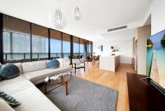 1201/1 Foreshore Boulevard, Woolooware, NSW 2230 Elegant Entertaining And Stunning Bay Views Immersed in an abundance of natural light, connecting the stunning contemporary design with the breathtaking Botany Bay views, Cronulla sandhills and city skyline. This luxury three bedroom apartment positioned on the 12th floor of the "Sea" Apartments takes inspiration from its stunning coastal environment.  Designed by the acclaimed Turner, Architects and delivering a relaxed contemporary style this exclusive apartment will excite your imagination and create lifelong family memories. Offering effortless entertaining and showcasing expansive views, the indoor outdoor spaces will captivate and entice you. Offering open plan lounge and dining spaces with floor to ceiling windows framing the stunning bay views. The generous contemporary kitchen includes integrated fridge and dishwasher, quality Bosch appliances and entertainers stone benchtops, creating the perfect space to gather the family. Three large bedrooms all with balcony access, the main with generous ensuite and walk in robes. Offering ducted air-conditioning, security intercom and a double carspace with two separate lock up storage spaces. Indulgent resort style facilities including the impressive W Club, which offers indoor lap pool, spa and sauna perfect for unwinding or sharing with friends and family. Enjoy the Sunset Cinema with views to Solander Playing Fields and family friendly lagoon pool with barbeque and pavillion spaces. This stunning apartment is sure to impress capturing the essence of relaxation and family, this premium residence offers unparralleled lifestyle opportunities.  