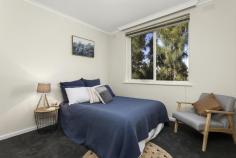  18/7 Curran St North Melbourne VIC 3051 Promising a carefree lifestyle, near vibrant city attractions, transport, Royal Childrens Hospital and University of Melbourne, this spacious two bedroom Hotham Hill apartment enjoys private, elevated rear aspect and Royal Park views. Offering appeal for both owner-occupiers and investors, it consists of freshly painted and carpeted open plan living, dining room, with balcony access, and a separate, previously updated kitchen with gas stove, dishwasher and scope to add your own style. There are two oversized bedrooms, with built-in-robes, original bathroom/laundry and separate toilet. In a well maintained block, secured by intercom/foyer entry, it includes split-system, storage and a car space on title. Zoned for University High and walking distance from Royal Park, shops, schools and trams, with Errol Street cafés, Queen Victoria Market, the CBD and CityLink all within easy reach. 