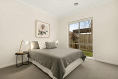  18 Newbury St Keysborough VIC 3173 Opposite parklands, this contemporary four bedroom, two bathroom residence delivers single level ease and low maintenance block, approximately 480sqm. Bright and inviting interiors comprise large open plan family/meals spaces and neatly adjoining living room where glass sliders spill to outdoor zones. Well-equipped for busy households, the kitchen showcases stainless steel appliances, modern island/counters and walk-in-pantry. Comfortable accommodation comprises four robed bedrooms, including master with smartly appointed ensuite. Features matching bathroom, ducted heating, split-system and double garage. Impressive for families and investors, it's close to Pirate Park, Tattersons Park, Sirius College, Haileybury College, Chandler Park primary, Parkmore Shopping Centre and Eastlink. 
