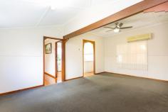  145 Malcomson St North Mackay QLD 4740 $215,000 This well presented low maintenance two bedroom cottage is a real cutie! Conveniently located in popular North Mackay and so close to Mount Pleasant Shopping,The Tavern, Bowls Club and a very short trip to the city. Features Include: - Two spacious bedrooms - main with air conditioning and built ins  - Lovely air conditioned living space  - Practical Kitchen - beautiful timber flooring  - Office / Workroom /Small guest room  - Covered outdoor living space - Garden Shed  - Tastefully presented throughout  - Low maintenance yard  Its not very big but its neat as a pin, so you can just move straight in - well suited to those entering the market for the first time, couples, singles and downsizers. Ask us about the Furniture Cash back offer*  Call Greg Smith today on 0413054742 to arrange your inspection! 