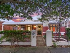  12 Kershaw St Subiaco WA 6008 This quintessential Subiaco home boasts nearly 100 years of character and charm and has a seamless extension and modern renovation to provide a well-proportioned, spacious family home that is ready for the next family to move straight in and enjoy. This home is the perfect blend of old and new. It features timeless character throughout including high ceilings, arched hallways, polished timber floorboards, ornate ceiling rose and stained glass windows. It has the latest modern conveniences expected in the highest quality luxury homes such as reverse cycle zoned ducted air conditioning, security alarm, quality stainless steel appliances and stone benchtops in the kitchen, laundry and both bathrooms. Cleverly designed for modern living, this home features two very generous living areas including an open plan kitchen, lounge and dining area that is bathed in natural north facing light and opens onto the outdoor entertaining area. The secure grounds and private gardens are fully reticulated and provide plenty of lawn area and entertaining terrace. There is secure undercover parking for at least two cars, a store room and access from a rear of way. Positioned on one of the most picturesque, tree lined streets in a quiet location. This home is a short stroll to Subiaco Primary School, Theatre Gardens and vibrant southernmost end of Rokeby Road café strip with an abundance of cafes, restaurants and bars. This convenient location provides the ideal inner city lifestyle. 