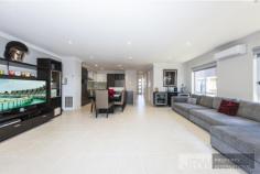  15 Ardenne Cl Burwood VIC 3125 $850,000-$930,000 Designed to embrace crisp, clean architectural lines and a sophisticated low-maintenance lifestyle, this sleek double storey residence sets the perfect tone for modern family life, executive living or stylish investing.  Splashed with northern light, the open plan living, dining and kitchen domain creates a superb social hub that showcases stunning stone benches, stainless steel appliances and a delightful island breakfast bench. Sliding doors introduce the outdoors, opening onto a sunbathed courtyard with low-maintenance paving and a brilliant retractable awning for shade cover during those warm summer days. A powder room and laundry offer convenience on the entry level, while the sleeping quarters rest upstairs and showcase three robed bedrooms, including a master bedroom with balcony and walk-through-robes to ensuite, further accompanied by a fashionable family bathroom and separate toilet.  Keeping the family comfortable, you'll find ducted heating and air conditioning, while a single garage with internal access ensures you're protected from the elements when arriving home.  Situated in a quality location, moments from Deakin Uni, PLC, Parkhill Primary, Essex Heights Primary, Ashwood Secondary, Mount Waverley Shopping Village, Burwood One, Jordanville Train Station, trams and Monash Freeway. *Photo ID required for inspection FEATURES  Air Conditioning Built-In Wardrobes Close to Transport Close to Shops Close to Schools 