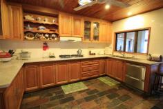  31 Old Home Hill Rd Ayr QLD 4807 $385,000 Neg What are you waiting for? This beautiful lowset 3 bedroom split block home is situated in a sought after quiet location in Ayr and is waiting patiently for you & your family to call her "Home". Positioned perfectly on a fenced 1702m2 block & offering everything possible to each & every member of your family. Venture inside & enjoy the layout & generous space within. Enviable in size the kitchen brags heaps of bench prep & storage. Big tiled dining with built-in bar & a very cozy airconditioned living area. All 3 bedrooms are airconditioned with built-ins & conveniently located near the bathroom amenities. Big tiled laundry with storage & so much more. A massive tiled, fanned, security screened BBQ/Entertaining area will blow you away as social gatherings with friends & family will surely be a constant occurrence. Big lush backyard with handy storage shed, bigger than usual garden shed. Front & back irrigation & pump & bore to keep it that "Magic" shade of green. Undercover parking is available for 2 but venture further & you will behold a "Colourbond" creation to make hubby happy. This huge shed has an extra height door at front for the caravan/reef boat which has also been partitioned separately & is fully lockable. 2 Roller doors at back & handy side door entry. Its powered & has shelving, storage & mezzanine floor. Wow! 5 kw Solar is available, side greenhouse for the gardener of the family & a front patio to enjoy your morning cuppa. So what are you waiting for? This one has everything & more. Hurry call us today!   FEATURES Indoor entertainment area Fenced Verandah Smoke Alarms Safety Switch Sprinkler System 