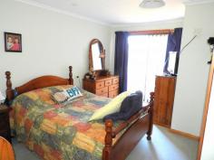  20 Cherrywood Dr Scamander TAS 7215 $365,000 (1817m2) This home sits within walking distance of the beaches, river, shops, hotel, post office, fishing, surfing and most of Scamander’s facilities. Upstairs offers 3 good sized bedrooms all with built-ins and the main with an ensuite, walk-in-robe, ocean views and deck access. The living  and dining area flow into each other and offers great space and deck access from both the dining and living areas. The main bathroom is spacious and has a spa bath, separate shower and timber vanity. Stairs lead to a very large rumpus/ games room or 4th bedroom. This area has its own  toilet and vanity, there are also 2 other utility rooms that run off the rumpus room. This area would be perfect for a teenager retreat or guest area. With some work it could be self-contained as it has its own access. There is also a double garage with carport at the rear of the property. All this sits on a large 1817m2 block with great established fruit trees and plenty of space for your boat or caravan. Good value here! 