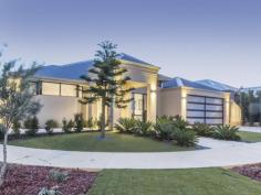  11 Burleigh Dr Burns Beach WA 6028 $699,000 A generous 570sqm (approx.) corner block just minutes from the sparkling-blue Indian Ocean within the magnificent Burns Beach Estate is the fitting setting for this immaculate 4 bedroom 2 bathroom plus study, Impressions-built home that will tick all of your boxes when it comes to quality modern low-maintenance living on the coast. Simply move right in, with nothing to do but to enjoy living your dream! The attention to detail and a clever design is a credit to the owners who have lovingly created a home full of functionality and comfort. When asked about the property, the owners replied.... "One of the things we loved about this home, was how we designed it. With the bedrooms well separated from the living area's, we were able to entertain and enjoy having guests over whilst our young children slept undisturbed in their bedrooms." If you thought the facade was impressive, then you will love what lies within - from the beautiful white plantation shutters welcoming you into a spacious study to a fantastic separate sleeping quarters that keeps the bedrooms peacefully away from the residence's noisy living zones. A sunken carpeted theatre room boasts built-in cabinetry and splendid views out to the garden and a trickling front water feature, but it is the stunning open-plan family, games and dining area that is the piece de resistance of the floor plan, incorporating the sleekest of kitchens into its stylish design and extending outdoors to a private backyard setting in the process. Highlighting the bedrooms is a sumptuous carpeted master suite with double doors for complete serenity, a walk-in wardrobe, rear lawn access and a huge ensuite bathroom with a spa, shower, toilet and twin vanities. Overlooking the grass and a delightful garden gazebo is a fabulous alfresco for outdoor entertaining all year round. With sprawling parklands in abundance nearby, beaches within walking distance and a close proximity to schools, shopping, public transport and freeway convenience, this flawless abode almost seems to good to be true. It really does exist though, Team Bridget and Sandra can vouch for that! Property Features: - Open-plan family, games and dining area with high-grade timber-look laminate flooring, built-in storage and a gas bayonet - Quality kitchen, comprising of sparkling stone bench tops, a 10kW split-system reverse-cycle air-conditioner, a breakfast bar for casual meals, stylish light fittings, a Bosch dishwasher and a 900mm Technika oven, five-burner gas cook top and range hood - Carpet to master suite and all bedrooms, including large 2nd/3rd bedrooms with built-in robes - Huge guest/4th bedroom with BIR's, outdoor access to the side and semi-ensuite entry into a massive main bathroom with a separate bath, shower and common powder room access - Functional laundry with a double linen press and outdoor access to the rear - Remote-controlled double garage with a storage area, shopper's entry and rear access - Very low-maintenance gardens, plus artificial front lawns - Feature entry door - Feature down lighting - 2.6kW solar power panel system - Solar hot water system with an instantaneous gas booster - Reticulation - Side access - Neutral decor throughout and designed to suit younger families with young children Property Location: - Close to the surf and sand at Burns Beach - Easy access to the end of the freeway and public transport - Short walk to a plethora of local parklands - Just minutes to Mindarie Marina All Offers Invited - All Offers Presented 