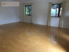  22 Lawton Ln Canungra QLD 4275 $550,000 NEG This neatly presented home on a large block is located right in the heart of Canungra town. Boasting 3 bedrooms with an external very large airy room with its own entrance, suitable for a 4th bedroom , rumpus, guest accommodation or games room. The kitchen, dining and living all a-join which creates the feeling of space and comfort.  There is a large entertaining area to the back with an additional undercover BBQ area.  To the front of the house sits a single carport and tucked down the side if the house there is a double lockup garage / workshop.  This home is a move in now with no need to do a thing, but could also be completely renovated by the astute investor looking to make some capital growth.  With rentals being in demand but low in supply in the town this would make for a great investment.  Call today to inspect. Features Air Conditioning Courtyard Fully Fenced Outdoor Entertainment Area Remote Garage Secure Parking Broadband Internet Available Built-in Wardrobes Pay TV Access Workshop 