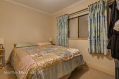  92 South Coast Hwy Orana WA 6330 $245,000 With six bedrooms, two living areas, a bigger-than-average block of 1121sqm and the convenience of a primary school across the road, this property is sure to be snapped up by a growing family. The fibro and Colorbond home still displays some of its original 1950s features, such as jarrah floorboards, timber window frames and high ceilings with decorative cornices, and it has been extended over the years to provide extra space. It is now a big home, ideal for families needing to accommodate a brood on a budget. The combined laundry and utility room has had a makeover and sports new tiles and built-in cabinetry, and the latest extension is a generous family area and dining room at the back. While the place would certainly benefit from further modernisation and the addition of a second bathroom, it is serviceable as it is, and would make an excellent starter property or one for the rental investor. Five of the six bedrooms are double sized and two have built-in robes, and there’s also a study or office at the front. In the original part of the house are the cosy lounge with a wood fire, and the kitchen with gas cooking and space for a meals table. The sunny family room has French doors to the extensive back yard. The garden is a kids’ paradise, mostly in lawn with various sheds, a shade house and raised vegetable beds as well as assorted fruit trees and a tall blue gum for shade. Alongside the house is a single garage with an adjoining workshop, both with power connected. There’s also off-road parking for three more vehicles. As well as Mt Lockyer Primary School just across the road, the high school and TAFE are also just 2km away – within easy walking or cycling distance – so school runs could be a thing of the past. A general store is a few doors away and a major supermarket and town are within a short drive. This property will appeal to those appreciating its potential for value-adding, its versatile quarter-acre block and the realistic price for this size. What you need to know: – 	 Fibro and Colorbond home – 	 1121sqm block (quarter acre) – 	 Some jarrah floors, high ceilings, timber windows – 	 Six bedrooms, five doubles and two with built-ins – 	 New laundry/utility room with built-in cabinetry – 	 Bathroom – 	 Lounge with wood fire – 	 New family room and dining area – 	 Kitchen with gas cooking and space for meals table – 	 Garden mostly in lawn – 	 Various sheds – 	 Raised vegetable beds – 	 Fruit trees – 	 Garage with power – 	 Workshop with power – 	 Good off-road parking – 	 Primary school just across the road – 	 2km from high school and TAFE – 	 Five minutes to town, supermarket – 	 Modernise and add value – 	 Ideal rental investment 