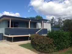  34 Wattle St Blackwater QLD 4717 $180,000 This three bedroom family home complete with huge 12m x 8m shed boasting power, tv & phone connections, whirly birds and big enough to house four cars would be appreciated in anyones standards. Cemented area between the shed and the house means entertaining is a breeze. Upon entering the 698sq m block you are impressed by the front deck, hedged surrounds and great car parking facilities. To one side of the home is a single carport with cemented area to fit a few more cars comfortably without even considering the huge shed out the front. Being a corner block you have fully cemented driveways to either street for ease of parking. Inside you are greeted by a large open plan living area cooled by two air conditioners, with new carpet flowing from the lounge down the hallway and into the bedrooms. The modern kitchen with ample bench space also has overhead cupboards to complement this area. The dining area is suitable for a large gathering with an office nook around the corner. A practical addition to any home. The double sink, wall oven, hotplates and rangehood with vinyl flooring finishes this area off nicely. The bathroom has a sliding glass door over the shower bath, white vanity unit and vinyl floor for ease of cleaning also to the separate toilet. Tiled flooring to the laundry area makes a statement in itself. This is a nice place to come home to with new interior paint, hallway cupboards, ceiling fans, verticals, air conditioning to two bedrooms with wardrobes to three, screens and exterior awnings for coolness. 