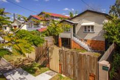 16 Bennetts Rd Camp Hill QLD 4152 Original four bedroom Queenslander cottage ready  for  a renovation makeover The basic essentials of  High ceilings / timber floors  / hardboard weatherboards are in place Get  ready  to  apply  your  renovation skills and  make  this home your special project Fabulous location. Easy walk through Wemberley parklands at rear  to  Coorparoo train station  Local schools and  shopping  just  a few  hundred meters  City bus  less than 200 meters This project is a blank canvas. Go  back  to  bare floorboards and start from scratch and re build to your potential 405 sq m lot  with a 10.1 M  frontage 