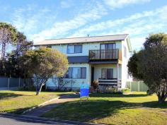  10 Pringle St Scamander TAS 7215 $345,000 Located in one of Scamander’s most sought after streets and within a short walk to the river mouth and beach, this 4 bedroom, 2 bathroom home offers a great opportunity to secure a tidy large home with expansive sea views. Currently set up with 3 bedrooms and 2 living areas, this two story home provides options to be set up as is or set up with 4 bedrooms and 1 living area.  The layout downstairs consists of 2 bedrooms, living, combined kitchen and dining, laundry and bathroom.  Upstairs consists of 2 bedrooms or one bedroom and a second living area plus a second bathroom. Expansive coastal, river mouth and sea views are taken in from both rooms on the upper level with views from St Helens Point to Falmouth and beyond.  A great place to keep an eye out for the migrating whales. Some sea views are also available from the living area on the lower level.  A single garage and workshop provide cover for the car and plenty of space for storage and workshop. Established fruit trees in the backyard provide loads of fresh fruit in summer and the established low maintenance gardens are well set out. If you are looking for a property in a sought after area, with expansive sea views and within walking distance of the beach, cafés, shops, renown fishing locations, surf breaks and much more, this one is sure to tick the boxes. 