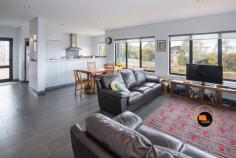  3 Galliers St Gracetown WA 6284 $1,335,000 Here is your chance to secure a fantastic family beach home perched high in Gracetown, with mesmerising elevated views of all the surf breaks within the Bay, including south towards the Ellen Brook stretch of coastline. Boasting a modern design and custom built by a reputable local builder this is a very attractive residence. Orientated to take advantage of the north facing solar passive aspect with outside living areas tucked out of the prevailing winds, this is a very inviting home to enjoy as a holiday house or comfortably as a permanent residence. Easily accommodate a large family and/or guests with dual living areas both upstairs and down.  Featuring a master ensuite retreat upstairs equipped with a full kitchenette, open plan lounge/living which flows onto the elevated viewing balcony. Wake up to amazing ocean views from the bedroom, check all the surf breaks and ocean conditions before planning your day. From the second storey you can relax and watch the whales migrating with stunning views extending beyond the shipping lanes, simply mesmerising. Downstairs has a generous sized kitchen with functional open plan living areas that also take in ocean views. Three bedrooms, a well-appointed bathroom and easy care tile floor throughout make it an easy lock and leave. From inside you can also access the undercover outside area and both the rear and front yard separately. Enjoy the walk-in benefits of a fenced backyard and lockable large Colorbond shed, dual water tanks, solar panels and bituminised driveways. This property is well set up and ready to enjoy for generations of summers to come. An easy walk down towards the beach through the shortcut path at the end of Galliers puts you on Osborne St in no time, close to the shops and caf, no effort for the kids to walk to the surf or beach without having to get in the car. Property features: * Outstanding panoramic views * Locally designed and custom built  * Dual kitchens (main downstairs and kitchenette upstairs) * Upstairs master bedroom with ensuite, open plan living, balcony to soak up spectacular panoramic views * Four bedrooms with master ensuite retreat * Modern bathrooms with separate w/c's * Fully fenced backyard, bituminised driveway  * Secure Colorbond shed large enough for car and gear * Solar panels, dual water tanks * Reverse cycle air conditioning * Quiet street location * Great permanent or holiday residence * Short stay income potential, subject to Council approvals A contemporary beach residence, very well located with many features you wouldn't normally find in a Gracetown beach house worthy of your consideration. Contact David Cross your Gracetown Real Estate Specialist today on 0439 496 926 to organise a private inspection. 