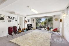  12 Kalang Road Elanora Heights NSW 2101 $1,900,000 Solid as a rock and full of light this home is a gracious classic From the moment you step inside the entry foyer you'll be drawn right into the generous living areas with their incredible sense of space and warmth. There is an abundance of natural light throughout the entire home. The expansive design is so versatile and would suit larger families, those with older children or those needing separate work or living accommodation within the one home - this home offers plenty of space for everyone! Accommodation is more than ample featuring four well proportioned bedrooms, all with built-ins; a separate study; two bathrooms - one with separate WC. The kitchen boasts under floor heating, gas cooktop and electric oven, a dishwasher and breakfast bar for meals on the go. Downstairs you'll find a large rumpus with wet bar adjoining the garages. But it's the living areas and near floor to ceiling glass walled dining area overlooking the impressively landscaped rear yard that really captures one's imagination. With the beautiful light, the hues of the magnificent sandstone features and the charm of the sunlit garden area just beyond this could easily become the perfect art studio. On a huge 1375 square metres outdoor entertaining is a breeze. There is plenty of space for the children to play or, more simply, for yourself to simply enjoy some space and privacy…your own space. Full double brick throughout with tile roof, the house is very solid and offers double car garaging with internal entry plus a workshop and miles of storage. From the high side of the street looking due east out to the ocean beyond and positioned an easy 400m stroll to the 'top shops', footsteps to the express bus, an easy walk to and within the local school catchment this is a sought-after lifestyle location. 