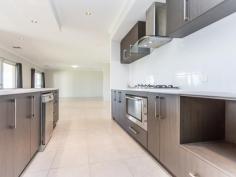  5 Flello Rise Bedfordale WA 6112 $649,000- $669,000 THE HEADING SAYS IT ALL! There are 4 ingredients a buyer is looking for when purchasing a property in Bedfordale. Well this property has 5! This has to be the best value property Bedfordale currently has to offer. Don’t take my word for it SEE FOR YOURSELF! This beautiful modern home built in 2014-15 will suit the largest of families looking to make a tree/lifestyle change. Boasting four double size bedrooms, two bathrooms, plus a front study. I highly recommend you put this on your shopping list. Upon arrival you cant help but be be impressed with the lovely modern facade of the property and the triple garage that greets you. Double door entry opens out to a large hallway with the open study and master bedroom offset to the right at the front of the home. The master bedroom is spacious, with walk in his & her robes and an impressive ensuite with his & her sinks and a double shower to scrub each others backs. The hub of the home is the jaw dropping open plan living space, so much room for the large family to spread out in. The fabulous chefs kitchen is located to the right as you enter, overlooking the designated meals area where the family can share the stories of the day. The family room is centrally located, with the double door TV/Theatre room accessed from here. The games area is definitely large enough for the pool table you have always wanted. All the double size guest bedrooms are located on the side wing, all have double built in robes and are serviced by a spacious bathroom with a separate shower and bath. The laundry is also located here. Other features include ducted reverse cycle air conditioning, tiled floors throughout the living area’s, gas cooking, dishwasher, walk in pantry, plus much more. If this isn’t reason enough to buy the property, then surely the massive 52m2 alfresco area could sway you, or the 7.5 wide x 12m long x 4m high powered workshop could be the deal sealer. This is directly accessed from the side of the block. There is also a large grassed area for the children to play, located behind the rear access of the triple garage. Last but not least ill throw in city views from the rear of the house, if this doesn’t do the trick nothing will. I can not wait to show this fabulous property to you. Make sure you make time to attend the home open. Call Andrew Hill anytime to chat. Features • Air Conditioning • Built In Robes • Dishwasher • Ducted Cooling • Ducted Heating • Outdoor Entertaining • Remote Garage • Reverse Cycle Aircon • Rumpus Room • Secure Parking • Study • Workshop 