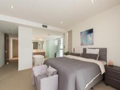  11 Helen Street Teneriffe QLD 4005 $1,500,000+ DOWNSIZE WITHOUT "DOWN" SIZING - TENERIFFE RESIDENCE. ELEVEN ON HELEN. Rarely do we find an inner city apartment with design elements as displayed in Eleven On Helen. There is a real architectural vision in this property resulting in generous open plan light filled interiors encased by glass walls opening to entertaining balconies capturing leafy street views. Discover lustrous stone flooring, rich timber veneer cabinetry and more glass enclosed outdoor living spaces as you move through the apartment. Flanking the formal dining space is a vast floating bench supporting the stainless steel Miele kitchen and glass splash backs. The Master Bedroom retreat is cocooned in a quiet space featuring an open design walk-in ensuite with island deep soak bath. An exceptional lifestyle property that delivers – 308 square meters of living on one level – 3 large built-in bedrooms – 2 bathrooms + guest powder room – Various outdoor balconies/living spaces – Master suite with separate parents’ retreat – 2 car lock up garage with storage – Secure lift access Live in the local village of Teneriffe with its array of coffee shops, restaurants, gyms and specialty shops. Only a short stroll to the City Cat ferry and City Glider bus service. Walk along the picturesque riverside boardwalk to New Farm park and the Powerhouse Performing arts centre. Only 20 min walk to the Brisbane CBD. Shop in the famous James Street precinct or around the corner is Gasworks Plaza. Features Air Conditioning Balcony Built In Robes Dishwasher Intercom Secure Parking 