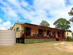  1062 COOYAR MT BINGA ROAD Cooyar QLD 4402 UNLIMITED AMOUNT OF OPPORTUNITIES When talking to buyers they are often looking for 3 things Acreage, Views and opportunities.  This property offers all these and much more.  When you step foot on this property you can tell it has an unlimited amount of opportunities. Currently comfortably running 30 head of cattle this home is only 28kms from Blackbutt and 10kms to Cooyar through natural landscape.  From the exposed rafters throughout the open planned Kitchen and Lounge to the back deck that opens up to the picturesque landscape views this property is not going to disappoint.  Featuring 3 bedrooms with an ensuite and built-ins plus bonus room for a study or office depending on your needs, this home also features a wood fire place and reverse cycle air conditioning in the lounge and air-con in the main bedroom.  With 100 acres of diverse land fenced into 7 paddocks with 4 dams and a seasonal creek that runs through the property, you also have the bonus of 5 permanent water holes. Enough water for all year round.  Also featuring 2 stables plus round yard, cattle yards with a race and a head bale.  With approx. 60 acres cleared - 40 acres of property with millable iron bark timber.  A Pump is set up on one of the dams hooked to a tank feeding 4 automatic water troughs servicing 3 of the paddocks + yards.  An old piggery can be used for goats or other stock.  With a large lockable garage large enough for 3 car spaces, NBN satellite and mobile phone coverage with the bonus of solar electricity to lower your costs this property exceeds all expectations.  You must come and have a look. ADDITIONAL FEATURES Deck Shed Solar Panels Water Tank. 