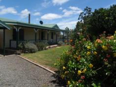  133 GREENHILLS DR BLACKBUTT QLD 4306 $395,000 VIEWS TO THE WEST- 3 B/ROOM - LARGE DECK- GARAGE ,CARPORT This 3 bedroom home with built-ins, is set on 4.97 acres with the greatest views to the west. This property has a wood heater, air con in the main bedroom, very fresh kitchen & bathroom. It has a large deck for a b-b-q or entertainment area. Plus a double lock up garage, double carport, security screen on doors & windows, well established gardens, fully fenced, approx. 32,000 lit of tank water for the house, & 3 tanks for the garden & vege patch. This property is approx. 2klm to Blackbutt. Come & have a look. ADDITIONAL FEATURES Air Conditioning Open Fireplace Balcony Deck Shed Fully Fenced Built-in Wardrobes Workshop. 