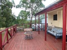  1062 COOYAR MT BINGA ROAD Cooyar QLD 4402 UNLIMITED AMOUNT OF OPPORTUNITIES When talking to buyers they are often looking for 3 things Acreage, Views and opportunities.  This property offers all these and much more.  When you step foot on this property you can tell it has an unlimited amount of opportunities. Currently comfortably running 30 head of cattle this home is only 28kms from Blackbutt and 10kms to Cooyar through natural landscape.  From the exposed rafters throughout the open planned Kitchen and Lounge to the back deck that opens up to the picturesque landscape views this property is not going to disappoint.  Featuring 3 bedrooms with an ensuite and built-ins plus bonus room for a study or office depending on your needs, this home also features a wood fire place and reverse cycle air conditioning in the lounge and air-con in the main bedroom.  With 100 acres of diverse land fenced into 7 paddocks with 4 dams and a seasonal creek that runs through the property, you also have the bonus of 5 permanent water holes. Enough water for all year round.  Also featuring 2 stables plus round yard, cattle yards with a race and a head bale.  With approx. 60 acres cleared - 40 acres of property with millable iron bark timber.  A Pump is set up on one of the dams hooked to a tank feeding 4 automatic water troughs servicing 3 of the paddocks + yards.  An old piggery can be used for goats or other stock.  With a large lockable garage large enough for 3 car spaces, NBN satellite and mobile phone coverage with the bonus of solar electricity to lower your costs this property exceeds all expectations.  You must come and have a look. ADDITIONAL FEATURES Deck Shed Solar Panels Water Tank. 
