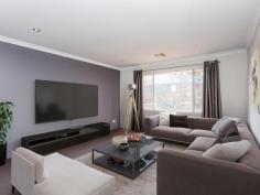  5 Flello Rise Bedfordale WA 6112 $649,000- $669,000 THE HEADING SAYS IT ALL! There are 4 ingredients a buyer is looking for when purchasing a property in Bedfordale. Well this property has 5! This has to be the best value property Bedfordale currently has to offer. Don’t take my word for it SEE FOR YOURSELF! This beautiful modern home built in 2014-15 will suit the largest of families looking to make a tree/lifestyle change. Boasting four double size bedrooms, two bathrooms, plus a front study. I highly recommend you put this on your shopping list. Upon arrival you cant help but be be impressed with the lovely modern facade of the property and the triple garage that greets you. Double door entry opens out to a large hallway with the open study and master bedroom offset to the right at the front of the home. The master bedroom is spacious, with walk in his & her robes and an impressive ensuite with his & her sinks and a double shower to scrub each others backs. The hub of the home is the jaw dropping open plan living space, so much room for the large family to spread out in. The fabulous chefs kitchen is located to the right as you enter, overlooking the designated meals area where the family can share the stories of the day. The family room is centrally located, with the double door TV/Theatre room accessed from here. The games area is definitely large enough for the pool table you have always wanted. All the double size guest bedrooms are located on the side wing, all have double built in robes and are serviced by a spacious bathroom with a separate shower and bath. The laundry is also located here. Other features include ducted reverse cycle air conditioning, tiled floors throughout the living area’s, gas cooking, dishwasher, walk in pantry, plus much more. If this isn’t reason enough to buy the property, then surely the massive 52m2 alfresco area could sway you, or the 7.5 wide x 12m long x 4m high powered workshop could be the deal sealer. This is directly accessed from the side of the block. There is also a large grassed area for the children to play, located behind the rear access of the triple garage. Last but not least ill throw in city views from the rear of the house, if this doesn’t do the trick nothing will. I can not wait to show this fabulous property to you. Make sure you make time to attend the home open. Call Andrew Hill anytime to chat. Features • Air Conditioning • Built In Robes • Dishwasher • Ducted Cooling • Ducted Heating • Outdoor Entertaining • Remote Garage • Reverse Cycle Aircon • Rumpus Room • Secure Parking • Study • Workshop 