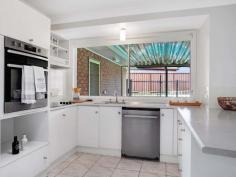  10 Scarlet Close Metford NSW 2323 $460,000 - $480,000 REFRESHED AND READY FOR NEW OWNERS There will be no place like home this summer when you move straight in to this entertainer’s delight at Metford. Featuring a fantastic in-ground swimming pool and massive enclosed entertaining area, this home is ideal for those who love to spend time outdoors, with a large, fully fenced yard adding to its appeal for families with children, or pet owners. Established trees and a large expanse of lawn help create a pleasant first impression for this brick and tile home, while fresh paint and new carpet throughout give the interior a nice, fresh feel. The house has been decorated in modern, neutral tones of predominantly white and grey, providing a blank canvas to which the new owners can add their own personal touches. Large windows and sliding doors allow plenty of natural light into the rooms, with a skylight in the kitchen enhancing the airy ambience. Larger than it first appears, the home features an L-shaped lounge room at the front, which can be completely closed off from the rest of the house for added privacy. A second living area is on offer in the large open plan kitchen, dining and living room, providing space for the family to come together in a relaxed and casual setting. A sliding door from this space provides access to the screened alfresco area while a large window in the kitchen overlooking the entertaining space adds to the indoor outdoor feel. Hard-wearing white tiles are a practical flooring option in this high traffic area, while newly laid grey carpet throughout the rest of the home creates a sense of warmth and comfort. The kitchen is sleek and contemporary looking, with bright, white cabinetry, a speckled stone-look laminate benchtop and stainless steel appliances. A built-in pantry, overhead shelving and cupboards, recessed fridge and microwave spaces and breakfast bar add to its practical layout, while also providing ample storage space. The adjoining open plan area provides direct access to one of the bedrooms, which would make an ideal home office for smaller families that didn’t need the additional sleeping accommodation. The remaining three bedrooms are grouped together along a central hallway, which also has access to the compact laundry and practical three-way bathroom. Two of these bedrooms feature built-in wardrobes, while the master suite has a spacious walk-in wardrobe with built-in shelving and hanging space.  A modern ensuite with its own shower, toilet and vanity provides parents with their own private space, while the well-appointed main bathroom caters for the rest of the family’s needs with a second shower and a large bath, as well as a separate wall-hung vanity with underbench cabinetry, and a separate toilet. A double-door linen cupboard provides additional storage space and is conveniently located in the hallway just outside the three-way bathroom. Ceiling fans in the bedrooms keep these spaces cool during the warmer months, while a split-system air conditioner in the west-facing living room keeps it comfortable year round. With plenty of space inside and out and an updated interior that feels light and bright, this home is refreshed and ready for a new family to move in. Ideally located in a quiet cul-de-sac, the home is within walking distance of a local playground and a short distance from nearby public and private schools, recreational facilities and neighbourhood shops. The bustling retail and entertainment destination of Stockland Green Hills is less than five minutes’ drive away, providing all your shopping and essential needs, while a range of other professional and healthcare services are also within easy reach, including the new state-of-the-art regional hospital, which is under construction at the other end of Metford. Ideal for families or first home buyers, the prime location of the property and its long list of features also make it a great opportunity for savvy investors. SMS 10Scar to 0428 166 755 for a link to the on-line property brochure.  Kitchen Built In Robes Air Conditioning Broadband Dishwasher Pet Friendly Outdoor Entertaining Area Fully Fenced In Ground Swimming Pool Solar Hot Water. 