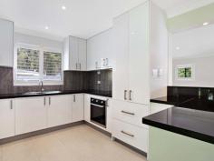  26 Woolley Close Thornton NSW 2322 $399,000 - $429,000 SECRET OASIS There’s certainly more than meets the eye when it comes to this magnificently renovated Thornton property, which combines sleek interior styling with a stunning front yard oasis you won’t want to leave. Situated on a quiet cul-de-sac surrounded by established homes, this three-bedroom Hardiplank and tile residence is sure to delight young families or downsizers, with a host of surprises at every turn. The property is part of a subdivisions where houses were typically built facing inwards towards a communal bushland corridor, with the garage or back fence fronting onto the street. In this case the orientation of the house has facilitated the creation of a peaceful and private front yard, surrounded by lush foliage and screened from the neighbours by large, established trees. Access from the street is via a deluxe double carport, which features a remote-controlled roller door and black aluminium perimeter fencing for added security.  Timber steps lead up to a covered rear porch, with a solid timber door providing direct access into the dining area at the back of the house. Recently repainted with a modern grey and white colour scheme that enhances the bright and spacious feeling of the rooms, the interior of the home has been fully updated with a long list of luxury inclusions creating a high level finish throughout. White timber plantation shutters provide a sleek, contemporary option for the window furnishings, while a combination of timber laminate floorboards, plush grey carpet and cool, white tiles add elements of comfort and practicality to various areas of the house. The home is divided into two distinct halves, creating a natural flow between the adjoining living areas and a practical separation from the bedroom wing. The three bedrooms are grouped around a central hallway space, which also provides access to the adjoining family bathroom. Two of the bedrooms, including the master suite, feature built-in wardrobes, while a double door linen cupboard in the hallway provides additional storage. The bathroom has been beautifully renovated, with floor-to-ceiling tiles, a wall-hung vanity and frameless shower recess with deluxe rain showerhead and built-in shelving providing little touches of luxury.  A European laundry has been concealed behind sliding doors opposite the kitchen, making the most of the compact layout without having to sacrifice valuable living space. The home has two separate living areas, including a good-sized dining room at the rear. A servery window and square set doorway enhance the feeling of space while also creating a practical connection between the dining room and adjoining kitchen. Sleek white laminate cabinetry, a glossy black stone benchtop and a concrete-look tiled splashback give the kitchen a modern industrial feel, with extensive underbench and overhead cabinetry and a floor-to-ceiling pantry providing ample storage space. White floor tiles flow from the kitchen through to the front of the home, with plush grey carpet in the adjoining lounge room offering a comfortable and cosy space to relax with the family. The stately double entry doors open up the living room to the covered timber deck at the front of the home, creating a seamless indoor outdoor flow for extended entertaining. The deck is a relaxed and peaceful space, with privacy screening at the side and masses of established plants giving it a lush, tropical feel. The deck has plenty of room to accommodate a dining setting and lounge near the amazing built-in barbecue, while the nearby spa provides another spot from which to relax and enjoy the serenity on offer. A large fenced yard with manicured lawn is ideal for pet owners and families with young children, while the property’s proximity to the neighbourhood shopping centre, public transport options, sporting facilities, primary school and playground add to its appeal. Thornton is ideally located close to the major regional transport links, with easy access to the New England Highway, Hunter Expressway and M1 motorway to Sydney, while the retail and entertainment hub of Stockland Green Hills shopping centre is less than 10 minutes’ drive away. Perfect for retirees looking to downsize, or for young families seeking a peaceful and private setting in which to raise their children, this unique Thornton property offers the complete package, with plenty of surprises on offer behind its unassuming street frontage. SMS 26Woolley to 0428 166 755 for a link to the on-line property brochure. Kitchen Built In Robes Air Conditioning Pet Friendly Outdoor Entertaining Area Fully Fenced Outdoor Spa Electric Hot Water. 
