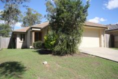  7 Okelly Court Collingwood Park QLD 4301 $329,000 BUSHLAND PEACE IN A CONVENIENT LOCATION Enjoy the peace of quiet of this home but still have great amenities on your doorstep. This neat and tidy home has great features for a home in this price range and should be added to you must see list. Your front entrance is discreetly located and attracts cooling breezes through the large entry and remainder of the house. The whole home is maintained with neutral features including the tiles, carpet and vertical drapes making it easy to stamp your style on it. The living area has beautiful high ceilings and flows out to a large covered outdoor area and easy to maintain yard.  A roomy kitchen provides ample bench space and includes a dishwasher, pantry and breakfast bar and would be perfect when entertaining. There are 4 bedrooms with fans and built-in robes, while the main bedroom has a spliys system air-conditioner and an ensuite. 