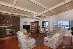  10 Tanjinn Street Dawesville WA 6211 Jo-Ann Yandle Presents . . . AWESOME ESTUARY VIEWS – BLUE CHIP LOCATION This well maintained and spacious 3/4 bedroom home set high on the hill in Tanjinn Street. Sweeping views far and wide of the pristine Peel Harvey Estuary will appeal to many. Relax out on the balcony and enjoy the views of the crystal blue waters and the boating activity on offer. Perhaps head out and catch some crabs for lunch or go for a spot of fishing. A paradise of activities await you. Meander along the pathways of the estuary or take a relaxing walk along the Dawesville Channel. This property has many features which include: * 3 bedrooms 2.5 bathrooms 3 wcs * One of the guest bedrooms has an ensuite bathroom, built in robes + ceiling fan * Master bed with walk in robe, ceiling fan and semi ensuite bathroom with corner spa, shower and vanity. * Separate guest quarters with evaporative air-conditioner and patio * Heaps of built in cupboards in main entry area. * Computer nook * Spacious modern renovated kitchen with waterfall edge bench-tops, gas hot plates, electric wall oven, dishwasher, microwave and large walk in pantry. * Dining, family room, kitchen with split reverse cycle air conditioner,ceiling fans and fire place. * Laundry area with vanity, shower and separate wc * Large front porch and paved sitting area. * Upstairs entertainment room with mini kitchen, feature timber floors and cathedral ceiling. * Timber balcony. * Double garage, paved driveway, gable patio for boat or extra vehicle. * Powered workshop. * Reticulated front and rear yard with garden shed. * 2 gas hot water systems * Sewer connected + Natural gas * Paved area at the front of the property for your caravan or extra vehicles. * Block size 956 sqm with 28.2 metre frontage. 