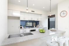  1/15 Mullenger Road Braybrook VIC 3019  $600,000 - $640,000 Great opportunity to purchase this modern, near new townhouse as part of one of the most prestigious developments in Braybrook. This beautifully designed home sets new standards in low maintenance luxury living. Top floor offers 3 decent size bedrooms with built in wardrobes, master bedroom with walk in wardrobe and ensuite, and additional central bathroom. Ground floor provides spacious open plan living and modern kitchen with quality finishes including stainless steel gas appliances and Caesar stone bench tops, adjoining meals and private courtyard, perfect for entertaining. Another great addition is a basement/lower ground level with a study space, European style laundry, powder room & under cover security parking with single lock up garage plus car space. Additional highlights include timber floorboards, double glazed windows, 4 separate split-systems heating & cooling to all bedrooms plus living area. Located in an ideal area with Pennell Reserve across the road, walking distance to Braybrook College, new Braybrook Shopping Centre and just a minute stroll to the Quang Minh Buddhist temple. Easy access to public transport makes this property a full package. 