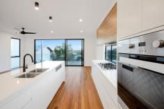  9-11 MARJORIE STREET  MOOLOOLABA QLD 4557 $1,225,000 Luxurious Mooloolaba Beach Homes Located in the heart of one of the country's most desireable and fastest growing regions to live the Sunshine Coast- Trinity Beach Homes at Mooloolaba present an incomparable opportunity to the astute purchaser. Built in synergy with the natural fall of the land each 3 Bedroom beach home offers an abundance of space, thoughtfully designed across multiple levels.  From the warm hues of the timber floors, a neutral interior palette, a wealth of natural light, high ceilings and the efficient use of cross ventilation to capture cooling sea breezes and the soothing sounds of the ocean, each home has been designed for year round comfort and sophisticated relaxed living. •Large entertaining decks with seamless integration - providing a haven where you can soak up the views and cooling breezes •Private courtyard with the option of a pool •Connoisseurs will appreciate the quality Miele appliances in the gourmet kitchen. Incorporating a large walk in butlers pantry with stone benchtops throughout •Light filled open plan kitchen and dining •Spacious separate lounge •Master suite with WIR and double vanity ensuite •Study nook •Laundry Chute •High quality fixtures, fittings and finishes throughout •Spit system air-conditioning to living and bedrooms •2 car garage with room for storage With two beach home designs available this collection of elevated spacious multilevel homes has been thoughtfully designed to capture the cooling sea breezes and views. Just a short stroll away from Mooloolaba and Alexandra Headland beaches, walk to esplanade cafes, restaurants, bars and shopping. An envied location with all its convenient lifestyle offerings and the peace, space an privacy of your very own freestanding beach home. 