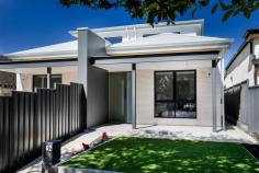  62 Elizabeth Street Norwood SA 5067 AT A GLANCE • Completed Nov 2018 • Torrens Title • Land size: 370m2 • Building size: 262m2 • 3 Bedrooms • 2.5 Bathrooms • Miele appliances • Fabulous Outdoor Entertaining Areas • 4.675KW Solar with a Fronius Primo Inverter • Huge BBQ set • Rear lane access • Double Garage with the ability to park 4 cars off the street THE RESIDENCE Brand new and styled as though it's straight from the pages of an interior design magazine, this gorgeous home is an absolute must-see. Boasting three bedrooms, two bathrooms and light-filled open-plan living, you are sure to fall in love with this luxurious abode. Cleverly designed to make full-use of the space on offer, the kitchen, living and dining spills out through large glass doors to a covered alfresco. The home chef will adore the stylish kitchen complete with stone benchtops, feature lighting, a good-size island and modern stainless-steel appliances. The master suite is on this lower level and offers a large walk-through robe and a dream ensuite with a bath, separate shower and a double vanity. A laundry and an additional half-bathroom complete the downstairs floorplan. Upstairs is home to two more large bedrooms with built-in robes and the main bathroom with a gorgeous walk-in shower. Timber-look flooring throughout, air-conditioning, a rainwater tank and a double garage with a panel lift door complete the long list of impressive features. THE LOCATION Norwood is one of Adelaide's most desirable locations, it's on the eastern fringe of the CBD and offers a fun and diverse lifestyle. With stunning character homes everywhere, designer shops and cafes not to mention a large amount of high class public and private schools in close surrounds, it's easy to see why this precinct is highly regarded. The suburb is great for a convenient lifestyle, you're only 20 minutes from the Adelaide Hills and 30 minutes from the beach. Running through the heart of the suburb is the fabulous Norwood Parade which has absolutely everything from Italian cafes and great coffee, supermarkets, huge cinema complex, clothing and shoe stores, pharmacies, banks, post office, doctors and so the list goes on. Offering a wonderful lifestyle just a stone's throw from the city, Norwood has it all. General Features • Council / City of Norwood Payneham & St Peters • Property Type: House • Expected rent - $850-$900 PW • Council Rates - $1433.07PA • Water/ Sewer Rates $808.44PA. 