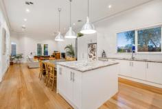  77 Geelong Road Footscray VIC 3011 $1,000,000 - $1,090,000 Circa 1910 Federation classic rejuvenated with contemporary class in the heart of the thriving Inner-West presenting flawlessly as a statement home for the suburb with unmistakable inspiring detail and period elegance of yesteryear. Every corner of the home is an aesthetic delight from the spacious bedrooms, alluring library sanctuary, designer bathroom, kitchen with stainless steel appliances/island bench and sweeping open plan layout with a seamless flow through the double French doors out to the low maintenance yard with secure roller door parking via Maldon Street. The pride of the home is undoubtedly the 3.5 metre ceilings, tiled fireplaces and hardwood floors with modern luxuries including refrigerated cooling, ducted heating, alarm, video intercom, hardwood flooring and stone finishes throughout. Zoned Activity 1 (ACZ1) on the corner of Malden Street identified as a mixed use location due to the convenience of retail, transport, services and amenity -the home can be also utilised for professional/commercial use walking distance to Barkly Street hospitality scene, opposite Gilmour Girls College, Middle Footscray Station, Seddon Village and 7km from the CBD. 