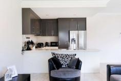  6/100 Findon Road  Woodville West SA 5011 This dual level townhouse enjoys a fluid and easy-care layout and is set on low maintenance grounds. The epitome of convenient effortless living, presenting an open plan lower level living, three generous bedrooms and valuable rear lane access to the undercover carport for two vehicles. An enviable opportunity for first home buyers, astute investors, empty nesters and those seeking to downsize. Positioned on Findon Road with many conveniences and amenities including an abundance of public transport links, and walking distance to The Queen Elizabeth Hospital, West Lakes Shopping Centre and short driving distance to the beach. Open plan lower level living with tiled flooring for easy maintenance Kitchen with stainless steel appliances including oven, gas cooktop and range hood Three bedrooms, master with ensuite & other with built in robes Separate laundry with external access and additional lower level w.c. and toilet Ducted reverse cycle air conditioning Outdoor entertaining overlooking low-maintenance grounds Rear access to the left of the home. 