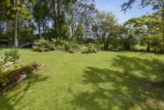  33 BUNYA STREET MALENY QLD 4552 $492,500 erfectly positioned just a few minutes' walk from the town centre of Maleny, this multi-level family home is priced to sell and must be SOLD!  This large 4 bedroom home is set on a spacious 1012m2 block with rural views to the rear of the property. Carpeted throughout with hardwood flooring underneath, the home is waiting for someone to capitalise and reveal the potential of the polished floorboards throughout.  This well built home has so much potential to improve and add value, or move straight in and enjoy.  Features include: - 4 bedrooms, 3 with built-ins - Air-conditioned lounge area with adjoining sunroom  - Modern open kitchen with dishwasher  - Dining area with adjacent breakfast nook - Bathroom upstairs and downstairs - Double lock-up garage with full tile flooring and internal access - Space to park the caravan or trailer - Large fully fenced backyard with rural views - Side access to the backyard  -Established vegetable garden - Walk to town centre and schools  