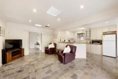  201 Police Road Mulgrave VIC 3170 Beautifully presented quality built family home with three separate living zones, a short stroll to Waverley Gardens Shopping Centre. Gleaming slate tiles greet you upon entry and lead you to a light filled open plan living area featuring a spacious country style kitchen with gas upright cooker and an adjacent meals area. An array of windows and sliding doors take you outside to a charming decked al fresco where you can enjoy your morning coffee amid private picturesque garden surrounds. Space for all the family with a separate formal lounge room plus a tranquil rear family room that overlooks a huge undercover decked entertaining area and stunning landscaped gardens. This family room could have a variety of uses including a work from home scenario as it has separate access. Three robed bedrooms, master suite with a sizeable walk in robe and ensuite, plus a family bathroom and separate toilet. Extra luxuries include ducted heating, evaporative cooling, alarm system, solar panels, garden shed, double garage and off street parking for up to six cars! Surrounded by primary and secondary schools including Wellington, Nazareth & Carwatha Colleges, public transport, parks, reserves, Valley Private Hospital and easy access to Monash and Eastlink Freeways. Inspection will delight! 