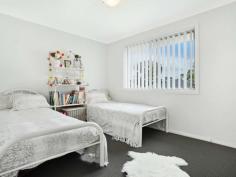  26 Redgum Circuit Aberglasslyn NSW 2320 $465,000 - $490,000 MODERN FAMILY HOME Walk to the supermarket and the sportsground from this perfectly positioned modern home, located in the family-friendly suburb of Aberglasslyn. Ideal for first home buyers, savvy investors or families looking for a light, bright and spacious home, this immaculately presented property is the complete package. Set on a low maintenance 512sqm block with a lovely landscaped backyard, fully fenced for privacy and security, the four-bedroom home offers plenty of space inside and out. Built in 2013, the home has oodles of street appeal with a contemporary painted brick and Colorbond roof facade and established gardens. The modern styling continues inside, with an on-trend white and grey palette offering a blank canvas for the new owners to decorate to their tastes. Designed for modern family living the home’s layout has the ideal separation between the living and sleeping quarters, with the bedrooms all running down the left side of the house. The spacious master suite sits at the front of the home overlooking the manicured lawn and established gardens, and features a large walk-in wardrobe and lovely ensuite with 20mm stone benchtop, large shower recess and wall-hung vanity with underbench storage and semi-recessed basin.  The remaining three bedrooms are all well-sized, with double-door built-in wardrobes offering plenty of storage, while the family bathroom is similarly styled to the ensuite, with dark grey floor tiles and crisp white wall tiles and vanity offering an attractive contrast. Light grey walls and an array of white surfaces also add a modern feel to the kitchen and living areas while helping to reflect the natural light streaming in through the sliding glass door to create a bright, inviting ambience. Large format floor tiles and sleek, white cabinetry enhance the contemporary feel of this space, while 20mm stone benchtops, stainless steel appliances and a glass splashback add to the kitchen’s high end finish. A separate lounge room leading off the open plan area provides a more private space for the younger members of the family to watch television or hang out with friends, while the seamless flow from the open plan area to the covered alfresco area make this the ideal space for entertaining. The alfresco area also provides the perfect spot to sit back and relax while watching the children play in the yard, which is well screened from the neighbours with high fences and established trees. Located in the vibrant community of Aberglasslyn, the home is ideal for families, with quality childcare and schooling in the surrounding suburbs and an array of sporting and recreational facilities within walking distance including the McKeachies Sportsground, which is on the same street as this property. The estate provides easy access to a neighbourhood shopping village and supermarket, which can be easily reached on foot, with the larger Rutherford shopping centre complex providing a wider variety of retail and essential services. The revitalised Maitland ‘Levee’ and CDB is just eight minutes east of Aberglasslyn, while the redeveloped Stockland Green Hills Shopping Centre, now a major retail destination, is around 15 minutes away. 