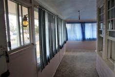  3 Yarrawonga St Warwick QLD 4730 $229,000 Elevated with views over Warwick Currently closed in veranda, original bay windows intact Large living room 3 Bedrooms Older style kitchen and bathroom Garage, Shed and Carport Currently rented at $300 per week FEATURES Fenced Low maintenance Safety Switch Smoke Alarms Broadband Internet Ready Pay TV Ready Close to school. 