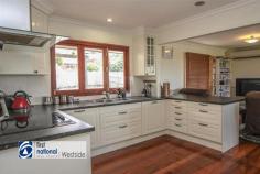  71 Diamond Street Riverview QLD 4303 $270,000 f you are looking for a high-set style home with all of the modern upgrades then you need not look further than this fabulous property. Set on an elevated lot, this home has so many fabulous features it will be hard to find anything that compares. At A Glance: - Beautiful polished timber flooring - Air conditioned open plan living, dining and kitchen area - Renovated kitchen with breakfast bar - Ceramic 4 element Stove with stainless steel wall oven and range hood - Timber feature windows opening up to the entertainment deck out back - 3 Bedrooms with timber floors, built in robes and air conditioning - Large bathroom with double vanity, large spa bath with shower above - Stunning entertaining deck at the rear of the house  - Fully fenced rear yard - Rates for the quarter of Oct – Dec 2018 @ $443.85 - Urban Utilities Sep - Nov 2018 - $232.65 Plus water consumption - Approximately 2.9 km to the Redbank Plaza Shopping Centre * - Approximately 500 meters to the Riverview Primary School * - Approximately 1 km to the Riverview Train Station * - Currently tenanted until January @ $310 per week - 607 m2 approx. block  It is such a lovely home with so many great features for you to enjoy for many years to come. The back yard is such a great size and fully fenced from the house back allowing for your furry four legged friends to run around or for your children to play in the safety of their own back yard.  The house is air conditioned in every bedroom and the lounge room so you can set the perfect climate no matter what time of year. The timber floors will make cleaning so easy for you and they are also perfect for those with dust allergies or pets. The bathroom is awesome, there is a spa bath where you can sit back and relax for hours with a glass of champagne. There is also a “his and hers” style double vanity so you do not have to put up with his hairs in her sink or her make up in his sink anymore. The Kitchen is possibly the deal maker with ceramic cook-top, wall mounted oven and a stainless steel range-hood. There is also a set of bi-fold windows that create a server right onto the rear deck. The pictures really do not do this home justice and it is a “must see” for anyone looking in this price range. 