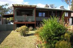  109 The Park Dr Sanctuary Point NSW 2540  $399,000-$429,000 What a delightful home! Located opposite St Georges Basin Golf Course and boasting 3 bedrooms (2 with built-in robes), attractive feature timber linings and split system Air Conditioning, this property will fit many buyers. The grounds are tastefully landscaped and show the benefits of a green thumb, with a lovely private verandah deck enjoying views across the greenery. The car accommodation has drive through access to the rear yard where a garden shed stands for storage of mowers and like things. Within walking distance to the Country Club and having the local bus pass the front door (with shops and facilities just minutes away) you should book your inspection here before you miss out! 