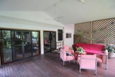  1235 Old Tully Road Maadi QLD 4855 $295,000 * Tropical and peaceful property * Spring fed creek plus bore! * Rainforest plus some fruit trees Getting back to nature is said to be good for the soul. Why not treat yourself to a space where you can relax and enjoy the best that nature has to offer. This 10,000m2 (1 hectare) property is very private and peaceful with rainforest gardens and mature fruit trees scattered throughout the yard. Fresh water will never be an issue, with a spring fed creek running along the rear boundary of the property, plus the advantage of an operational bore. As you make your way down the picturesque driveway to the quaint 2 bedroom home, you'll feel like you are miles away from everything. Yet, the conveniences of Tully and the beauty of Mission Beach are only a 15 minute drive away. Key features of the property include: * 2 good sized bedrooms with built in robes * Open plan living / dining * Separate media room with built in lounge seat * Solid kitchen overlooking the living area, with electric oven and cooktop * Timber decking area for entertaining friends and family * Double carport + workshop area * New awnings, gutters, insulation and ceiling fans * Large water tank that can be filled from the bore (via pump) * Spring fed creek running along the rear boundary * Lush gardens - a mix of rainforest, formal gardens and lawn. 