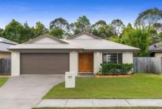  1 KOORINGAL STREET TINGALPA QLD 4173 $625,000 Wonderfully located in the high demand suburb of Tingalpa and within close proximity to Moreton Bay, schools both public and private, Wynnum Plaza and Aldi, Cafes, restaurants and parks for the kids. This stylish, lowset brick and tile home is only 9 years old. Boasting four very large bedrooms all with built in robes, ceiling fans, roller blinds and Air conditioning. The master bedroom includes private walk in robe with built in cabinetry and attached ensuite. A double door hall way cupboard allow for extra storage which is often missing in new homes. The modern, open plan kitchen and dining flows out to the delightful, undercover entertaining area. The kitchen is well appointed with a unique L shape island bench, stainless steel appliances, 5 burner gas cook top and electric oven. There is ample cupboard space as well as breakfast bench for the kids. The bathroom has a separate shower and bathtub perfect for young families and all fittings are stainless steel. The outdoor dining area is perfect for the summer BBQ’s and is set amongst tranquil bushland so no rear neighbours. The yard is fully fenced for the family pet. Loaded with essentials, the home comes with quality fixtures and fitting, easy care tiles in all the living spaces, double lock up garage with extra storage space, ceiling fans and split system air conditioning, a 5000lt rainwater tank and electronic keyless entry. Be quick and make this house your new home today. 