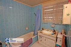  5 Bannerman Street Riverview QLD 4303  $225,000 This property would suit either an investor looking for a property with a tenant already in place; or, an owner occupier that is looking for an entry level property, with a few extras you do not often find in this price range. Yes, you can probably find some putty and paint work that needs doing; but, at this price the property represents great value. For the investor, the current tenant, who has been at the property for approximately 8 years, is on a periodic lease paying $225 per week. He has indicated that if the property is sold to an investor that he may be interested in staying on. For the Owner Occupier this property provides a great opportunity for a young family that would enjoy the benefits of the pool and the shed, things rarely seen in this price range. For those with young children the Local Primary & Pre School is at the end of the street, approximately a 500 m walk. At a Glance: - 3 bedrooms mid-set style home (4 steps through front door) - Brick Pier with cement sheet inlays under the windows construction - Concrete tile roof  - Drive through Single Carport to a - Free standing Double Lock up Garage  - In-ground pool - Property is on metered Town Gas  - Solar Panel Array on roof  - Instantaneous gas hot water system approximately 1 year old  - Current tenant paying $225 per week, on a periodic lease has been at the property for approximately 8 years and has indicated may if possible stay on  - Fully fenced 640 m2 approx. block Inside: - Timber floors throughout - Functional kitchen that overlooks the backyard and pool - Shower over the bath and separate toilet - Open plan living area with combustion stove  - Separate laundry Location: - Approximately 1.9 km to the Redbank Plaza Shopping Centre *  - Approximately 500 m to Riverview Primary & Pre School * - Approximately 1.4 km to St. Peter Claver College * - Great Access to Ipswich Road and the Logan, Cunningham & Warrego Highways 