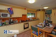  5 Bannerman Street Riverview QLD 4303  $225,000 This property would suit either an investor looking for a property with a tenant already in place; or, an owner occupier that is looking for an entry level property, with a few extras you do not often find in this price range. Yes, you can probably find some putty and paint work that needs doing; but, at this price the property represents great value. For the investor, the current tenant, who has been at the property for approximately 8 years, is on a periodic lease paying $225 per week. He has indicated that if the property is sold to an investor that he may be interested in staying on. For the Owner Occupier this property provides a great opportunity for a young family that would enjoy the benefits of the pool and the shed, things rarely seen in this price range. For those with young children the Local Primary & Pre School is at the end of the street, approximately a 500 m walk. At a Glance: - 3 bedrooms mid-set style home (4 steps through front door) - Brick Pier with cement sheet inlays under the windows construction - Concrete tile roof  - Drive through Single Carport to a - Free standing Double Lock up Garage  - In-ground pool - Property is on metered Town Gas  - Solar Panel Array on roof  - Instantaneous gas hot water system approximately 1 year old  - Current tenant paying $225 per week, on a periodic lease has been at the property for approximately 8 years and has indicated may if possible stay on  - Fully fenced 640 m2 approx. block Inside: - Timber floors throughout - Functional kitchen that overlooks the backyard and pool - Shower over the bath and separate toilet - Open plan living area with combustion stove  - Separate laundry Location: - Approximately 1.9 km to the Redbank Plaza Shopping Centre *  - Approximately 500 m to Riverview Primary & Pre School * - Approximately 1.4 km to St. Peter Claver College * - Great Access to Ipswich Road and the Logan, Cunningham & Warrego Highways 