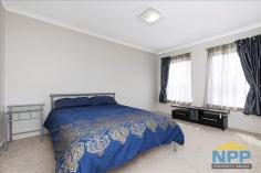  15 MacMillan Blvd Canning Vale WA 6155 $515,000 You are welcome to view this ideally-situated air-conditioned 4 bedroom, 2 bathroom double-storey home. Large tiled downstairs area with laundry, powder room and kitchen. Two bedrooms, with en-suite and walk in robe in the master. The other bedroom may also be converted to a home office. Two large living areas and low maintenance alfresco. Double remote control garage. Upstairs has two bedrooms and a bathroom. Vertical blinds through-out with curtains. 