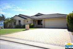  12 MAKJANICH PLACE SUCCESS WA 6164 $469,000 Modern four bedroom, two bathroom air-conditioned home. Generous en-suite bathroom comes with his and hers vanity. Walk in robe in master and all other double bedrooms with built in robes, separate formal lounge, tiled family and games room, gas hot water system, gas cooking, alarm system, double remote control garage with access to the rear for a trailer or boat, reticulated lawns and gardens. Rear alfresco area for entertaining and lawns to keep the kids happy. Calder-sac location.Located close to schools, Gateway Shopping Centre, Last Drop Brewery Beeliar, Free way, parks and bus and train transport. 