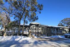  11/10 Chamois Road Mount Buller VIC 3723 $539,000 Located in the lovely Elkhorn building with its own private entry, this apartment is just 50m to the nearest ski run and a short stroll to the village with restaurants next door and across the road. Naturally lit open-plan living and dining is surrounded by a gas fireplace. Fully functional kitchen with loads of space. There’s plenty of room for the whole family. Two decent sized bedrooms, one with a queen bed, second with 2 bunk beds to sleep a total of 6 comfortably. Both have built-in wardrobes. The apartment also has two fold-out couches in the living room. Large main bathroom with a separate toilet connecting the laundry. In a good location with enviable garage parking, ample storage space and good drying facilities, there’s nothing left to do except pull out the ski gear and hit the slopes. This apartment is being offered fully furnished for a smooth transaction. 