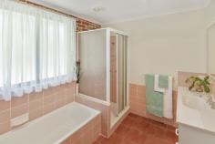  11 Sandpiper Place Aroona QLD 4551 $799,000 This is a stately brick residence on a large secluded block, offering room to move plus truck, boat, caravan storage if required. Good glimpses of the ocean and lush green landscaping provide the backdrop to comfortable, spacious living. This is the one that you have been waiting for to call home.  This residence is only a 760 metre stroll to the Aroona local shopping centre .  Consisting of: Four bedrooms, one of which is on the lower level and is complimented with a separate bathroom, this could be used as a separate living facility, this bedroom opens onto the lower balcony The upper level three bedrooms are all spacious with built in cupboards to the master, ensuite plus large his & her wardrobes, this bedroom opens onto a wide balcony. Design features high raked, timber ceilings with exposed beams in the living, kitchen and family rooms, which are all tiled. The rear balcony, which joins all living areas, is 2.9 metres wide x 21 metres in length. A covered deck at the main entry on the east elevation is complimented by a fully landscaped front garden. The kitchen offers abundant bench space and extensive storage. Air-conditioning in the main living area which is complemented by ceiling fans throughout Security screens throughout. Two lock up garages plus vehicle cover under the Southern deck. The property has an area of 311m2 plus a dry 80m2 storage area on the lower level. The block is completely fenced and landscaped. 