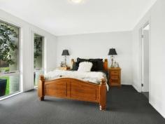  26 Redgum Circuit Aberglasslyn NSW 2320 $465,000 - $490,000 MODERN FAMILY HOME Walk to the supermarket and the sportsground from this perfectly positioned modern home, located in the family-friendly suburb of Aberglasslyn. Ideal for first home buyers, savvy investors or families looking for a light, bright and spacious home, this immaculately presented property is the complete package. Set on a low maintenance 512sqm block with a lovely landscaped backyard, fully fenced for privacy and security, the four-bedroom home offers plenty of space inside and out. Built in 2013, the home has oodles of street appeal with a contemporary painted brick and Colorbond roof facade and established gardens. The modern styling continues inside, with an on-trend white and grey palette offering a blank canvas for the new owners to decorate to their tastes. Designed for modern family living the home’s layout has the ideal separation between the living and sleeping quarters, with the bedrooms all running down the left side of the house. The spacious master suite sits at the front of the home overlooking the manicured lawn and established gardens, and features a large walk-in wardrobe and lovely ensuite with 20mm stone benchtop, large shower recess and wall-hung vanity with underbench storage and semi-recessed basin.  The remaining three bedrooms are all well-sized, with double-door built-in wardrobes offering plenty of storage, while the family bathroom is similarly styled to the ensuite, with dark grey floor tiles and crisp white wall tiles and vanity offering an attractive contrast. Light grey walls and an array of white surfaces also add a modern feel to the kitchen and living areas while helping to reflect the natural light streaming in through the sliding glass door to create a bright, inviting ambience. Large format floor tiles and sleek, white cabinetry enhance the contemporary feel of this space, while 20mm stone benchtops, stainless steel appliances and a glass splashback add to the kitchen’s high end finish. A separate lounge room leading off the open plan area provides a more private space for the younger members of the family to watch television or hang out with friends, while the seamless flow from the open plan area to the covered alfresco area make this the ideal space for entertaining. The alfresco area also provides the perfect spot to sit back and relax while watching the children play in the yard, which is well screened from the neighbours with high fences and established trees. Located in the vibrant community of Aberglasslyn, the home is ideal for families, with quality childcare and schooling in the surrounding suburbs and an array of sporting and recreational facilities within walking distance including the McKeachies Sportsground, which is on the same street as this property. The estate provides easy access to a neighbourhood shopping village and supermarket, which can be easily reached on foot, with the larger Rutherford shopping centre complex providing a wider variety of retail and essential services. The revitalised Maitland ‘Levee’ and CDB is just eight minutes east of Aberglasslyn, while the redeveloped Stockland Green Hills Shopping Centre, now a major retail destination, is around 15 minutes away. 